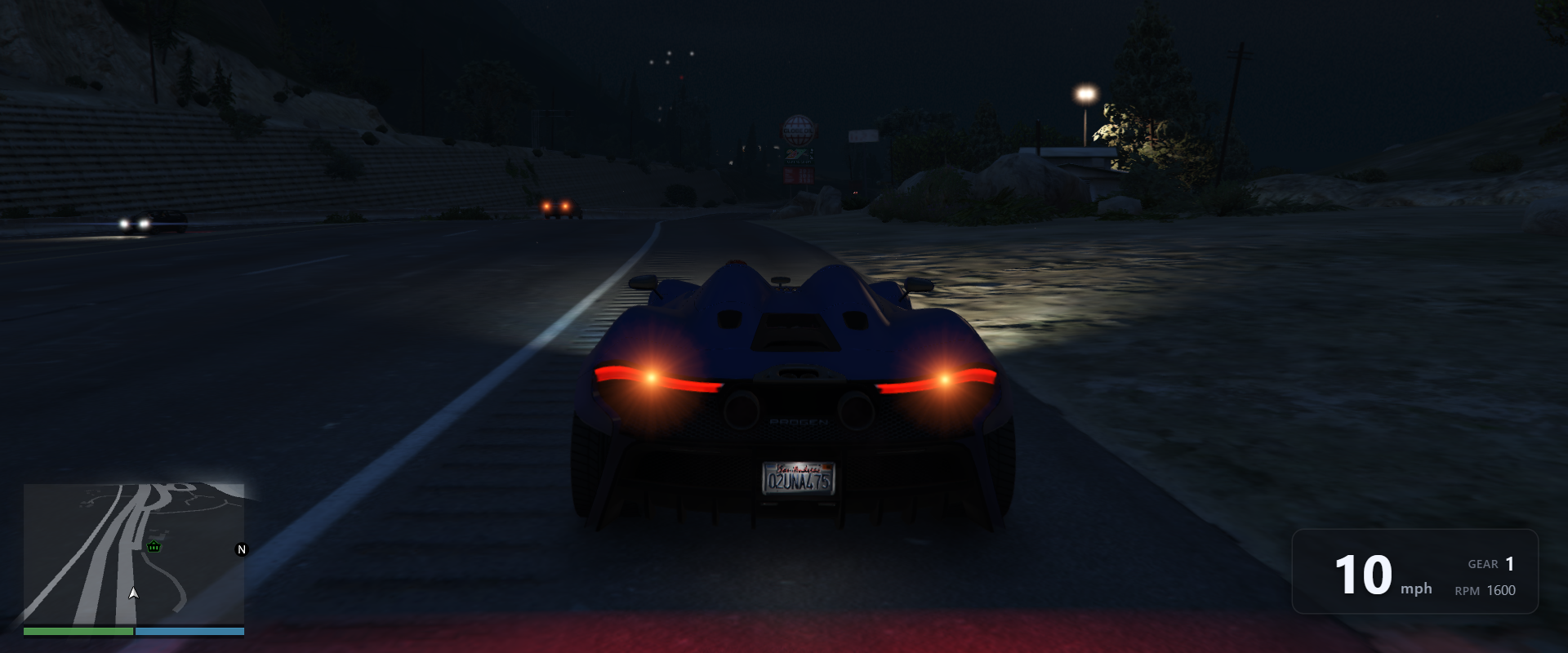 Digital speed and gear readout in the bottom-right corner while driving a Progen Furia at night